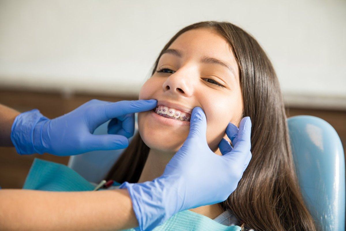 A patient receiving fixed-braces care